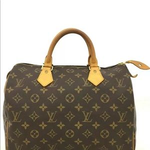 Louis Vuitton Monogram Speedy 30 Boston bag.